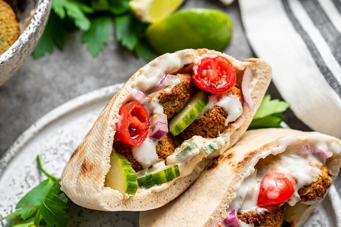 Private Eiffel Tower Tour With Falafel and Wine Tasting - Age Restrictions and Disclaimer