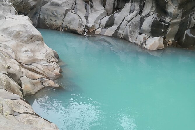 Celeste River Waterfall, Volcano Rainforest Hike & Exuberant Tour in La Fortuna - Tour Highlights
