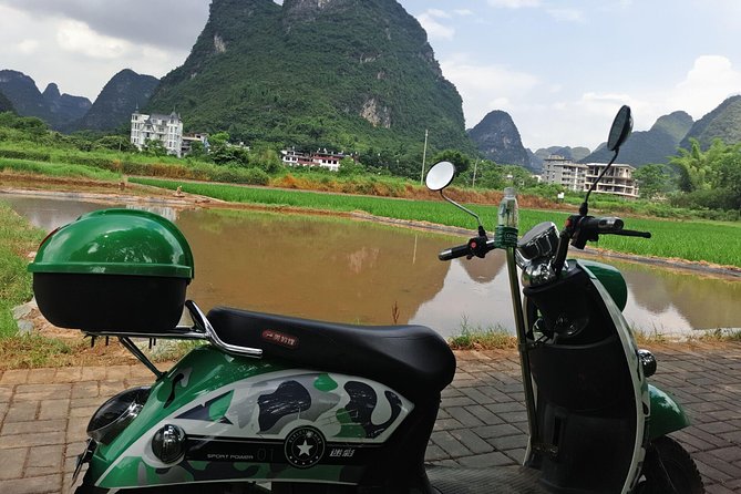 Full-Day Li-River With the 4 Star Luxury Boat VIP Room & Yangshuo E-Scooter Tour - Tour Overview