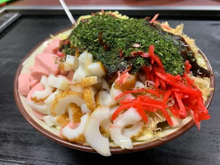 Okonomiyaki Cooking at a Traditional Restaurant. - Overview of Okonomiyaki