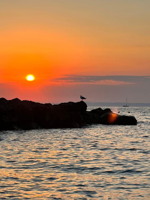 Sharing Sunset Boat Tour With Hotel Pickup