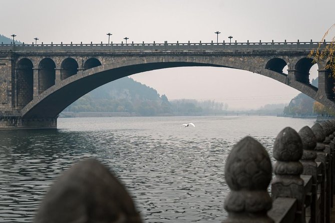 Private Half-Day Longmen Grottoes Walking Tour From Luoyang - Pickup Information