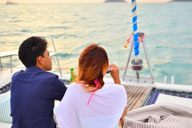 Half-Day Banana Beach Sunset Sail by Luxury Catamaran - Water Sport Activities