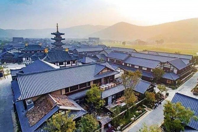 Wuxi Private Day Tour With Lingshan Buddhist Scenic Spot and Nianhua Bay Village - Tour Highlights