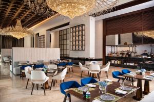 Al Jaddaf Rotana Suite Hotel - Accommodations and Amenities