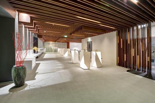 The Act Hotel Sharjah - Accommodations and Amenities