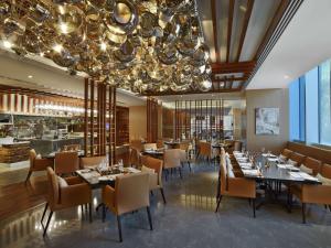 V Hotel Dubai, Curio Collection by Hilton - Accommodations
