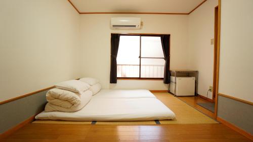 House Ikebukuro - Room Types and Amenities