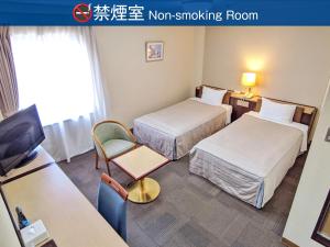 Kadoma Public Hotel - Room Types and Amenities