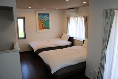 Pension Nirai Kanai - Room Types and Amenities