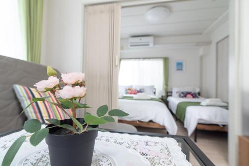 Uhome Iriya Apartment - Room Types and Amenities