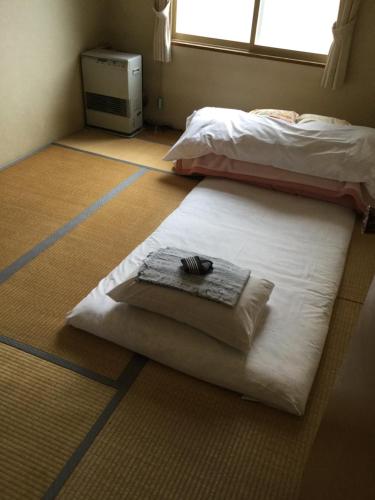 Business Hotel Matsuoka - Room Types and Amenities