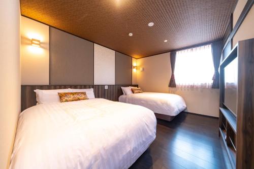 Kagetsu Taisyokan - Room Accommodations and Amenities