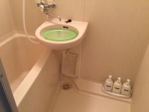 Business Inn Grandeur Fuchu - Booking Process and Policies