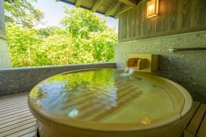 Jozankei Onsen Yurakusoan - Room Features and Amenities