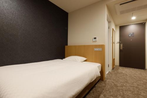 Plum Hotel - Accommodations and Rooms