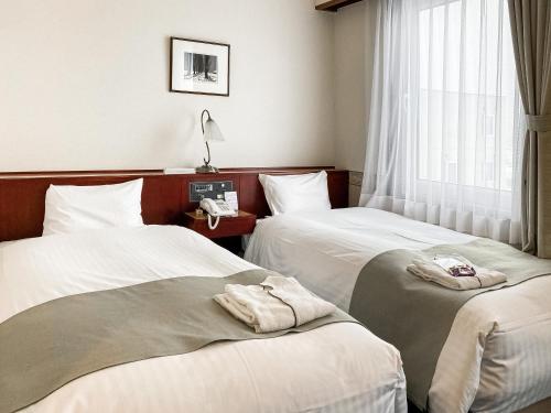 Tabist Abashiri Central Hotel - Room Types and Features
