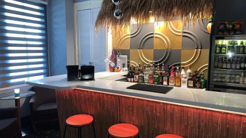 Tropics Beach Hotel - Rooms and Amenities