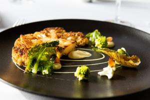 Macdonald Bear Hotel - Historical Significance