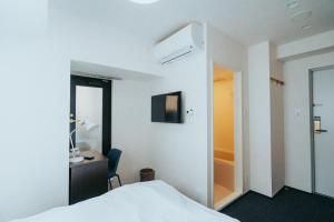 Unito SHIODOME - Check-In and Check-Out