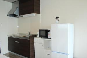 Gate Inn Nago - Room Types and Features