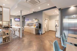 Grand Hotel Clichy Paris - How To Book Your Stay