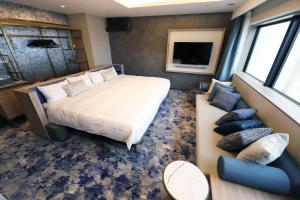 Spa World HOTEL&RESORT - Room Amenities and Features
