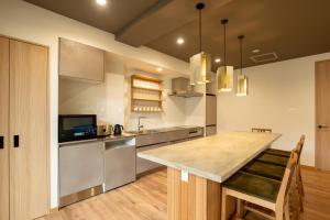 Tanuki Nozawa - Check-in and Check-out