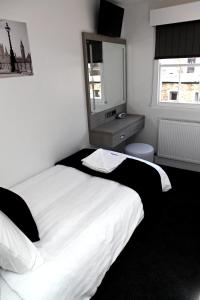 The Omega Hotel - House Rules and Policies