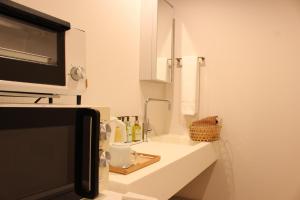 Hachi Inn - Booking and Check-in/Check-out