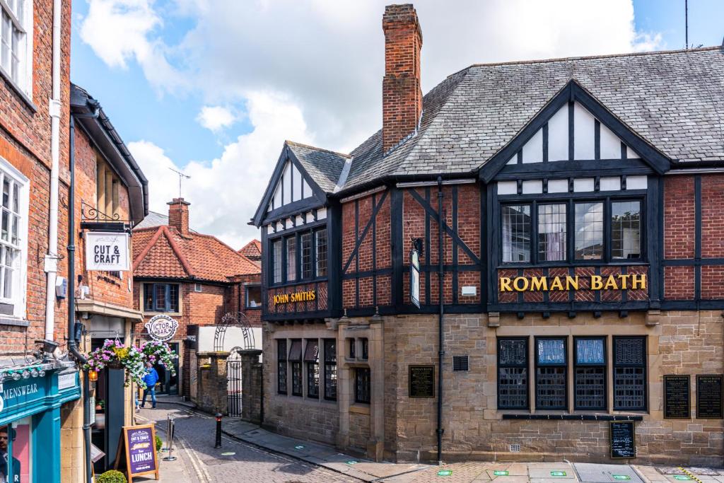 The Roman Bath Review
