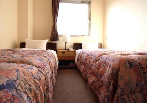 Hotel Okuni (Royal Inn Group) - Hotel Overview and Location