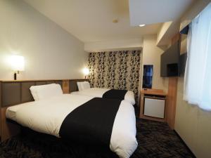 APA Hotel Kagoshima Chuo Ekimae - Rooms and Amenities
