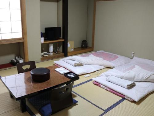 Hotel Suehiro - Room Types and Accommodations