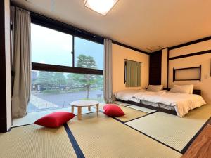 Jinya Sunset Inn by Murasaki - Rooms Blending Hostel and Hotel Elements