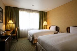 International Resort Hotel Yurakujo - Booking and Check-in Details