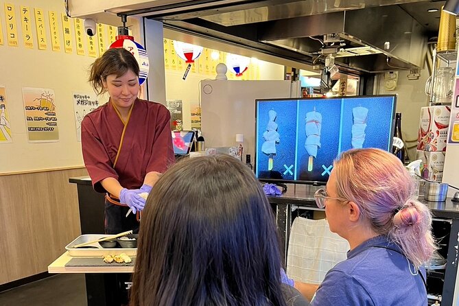 Sake Tasting and Yakitori & Onigiri Making Experience - Sake Tasting: Exploring Japanese Flavors