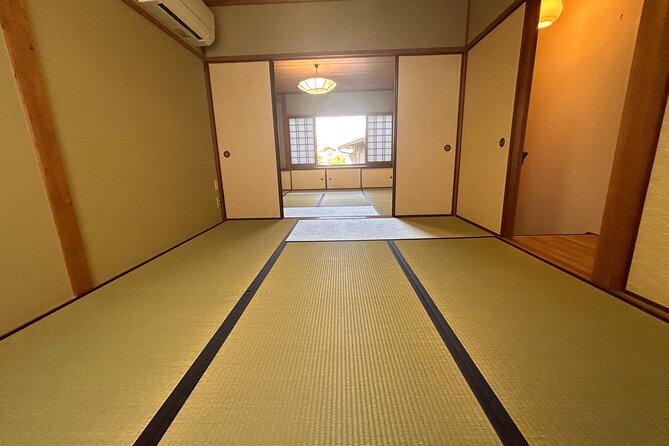 Tea Ceremony in 100 Years Old Townhouse With Tables and Chairs - Participant Interaction and Engagement