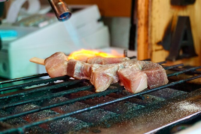 Tokyo Fish Market Food Tour: Street Food & Friendly Guide - Exploring the Tsukiji Fish Market