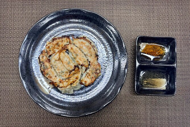 Ramen Gyoza Onigiri Japanese Cooking Class in Kyoto - Dining on the Dishes