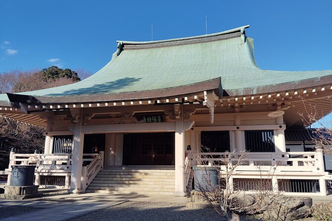 Gotokuji Temple Walking Tour With Numerous Cat Statues - The Legend Behind the Beckoning Cat Statues
