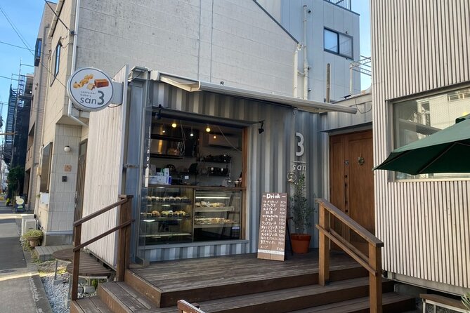 Old Tokyo History Coffee Gardens and Traditional Street Food - Indulging in Sunamachi Ginzas Traditional Snacks
