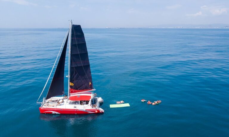 Barcelona: Sunset or Day Catamaran Cruise With Tapa & Drink