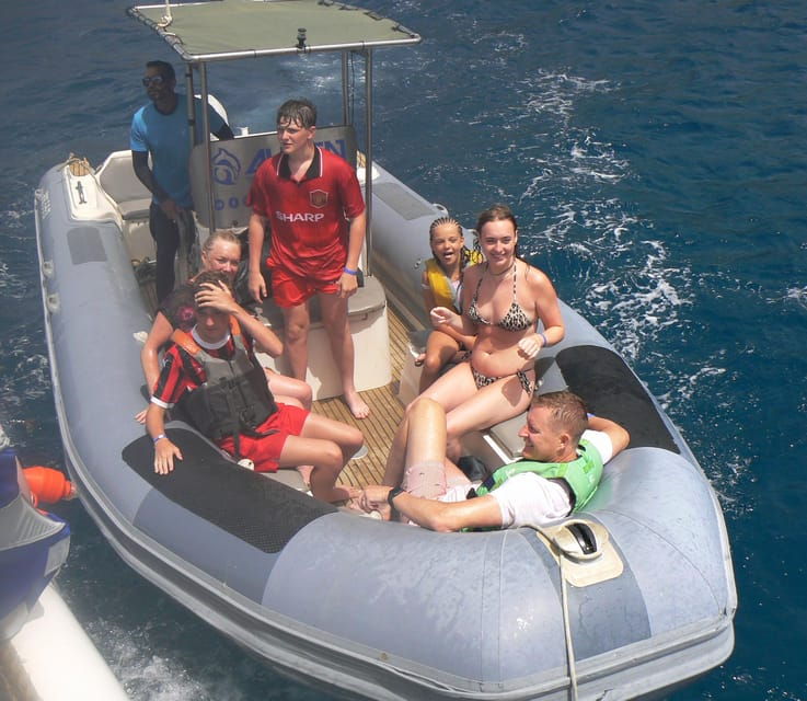 From Puerto Rico: Boat Trip Along the Coast W/ Food & Drinks
