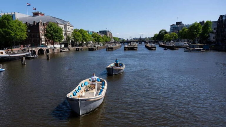 Amsterdam: Canal Cruise in Open Boat with Drink Option