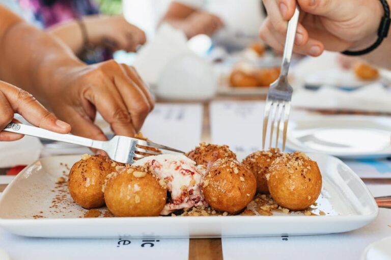 Fira: Guided Foodie Walking Tour with Tastings