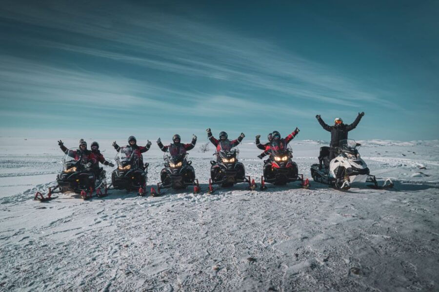 From Alta: Daytime Snowmobile Adventure - Exploring the Arctic Wilderness on Snowmobiles
