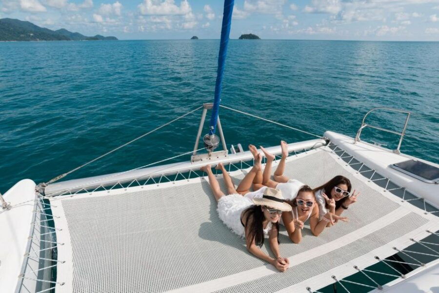 From Ornos: Mykonos Delos Catamaran Cruise with Meal & SUP - The Experience: What You Can Expect