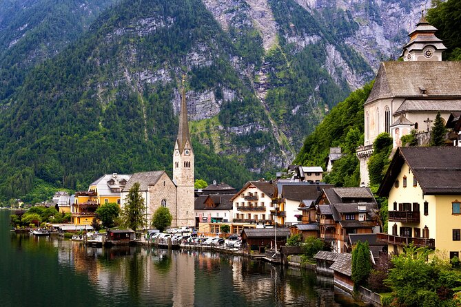 From Vienna: Day Tour to Hallstatt and Salzburg with Boat Ride