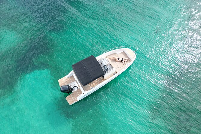 Private Boat Tour of San Antonio with Paddel surfing and Snorkeling - The Itinerary: Three Unique Stops with Something for Everyone